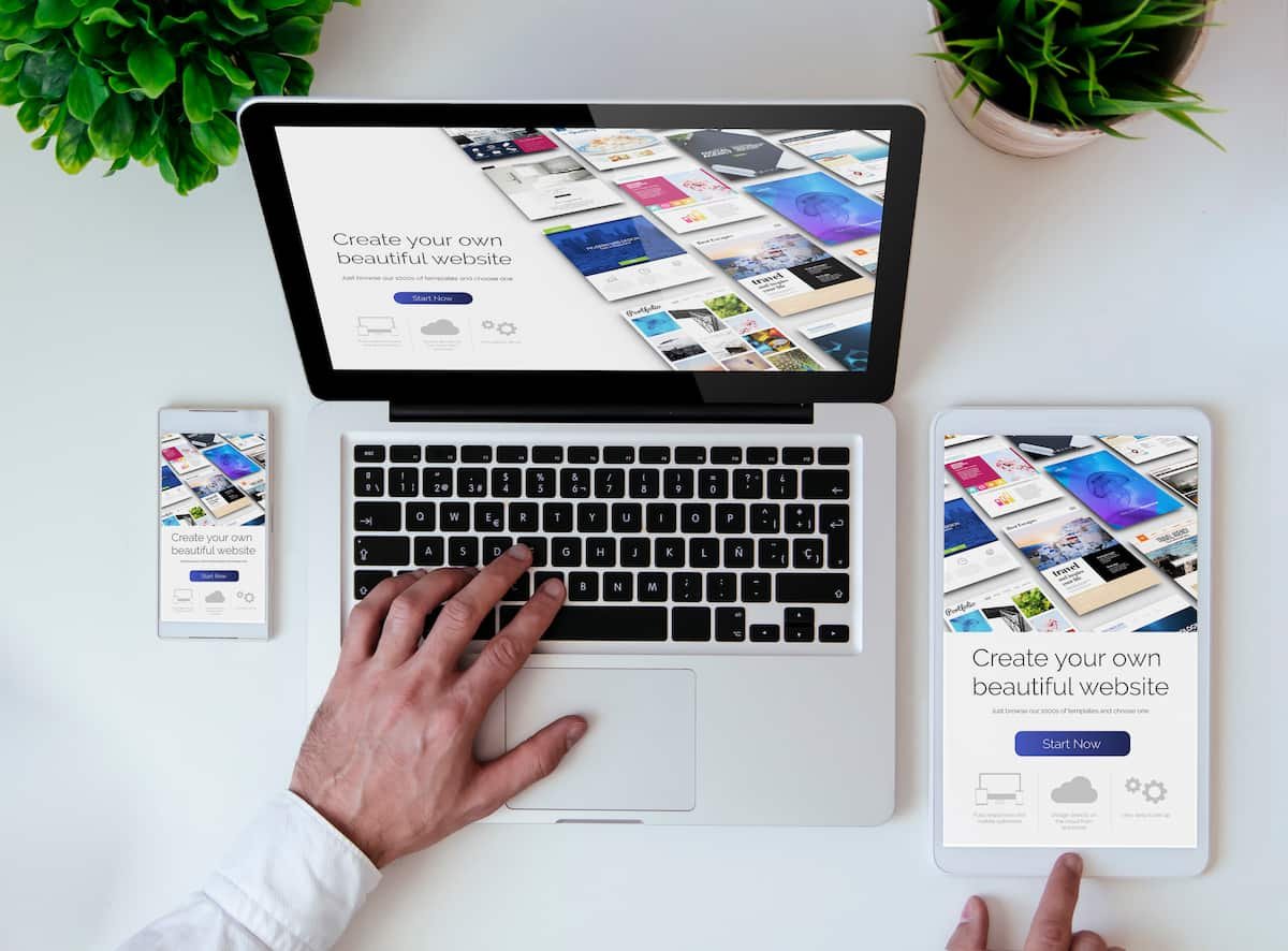 office tabletop with tablet smartphone laptop showing website builder 1 Website Upgrades Marketing Strategies,Social Media Marketing Hazlet NJ,Digital Marketing Consultant Online,Social Media Services Near Hazlet NJ,Best Social Media Marketing New Jersey Eighteen Webs